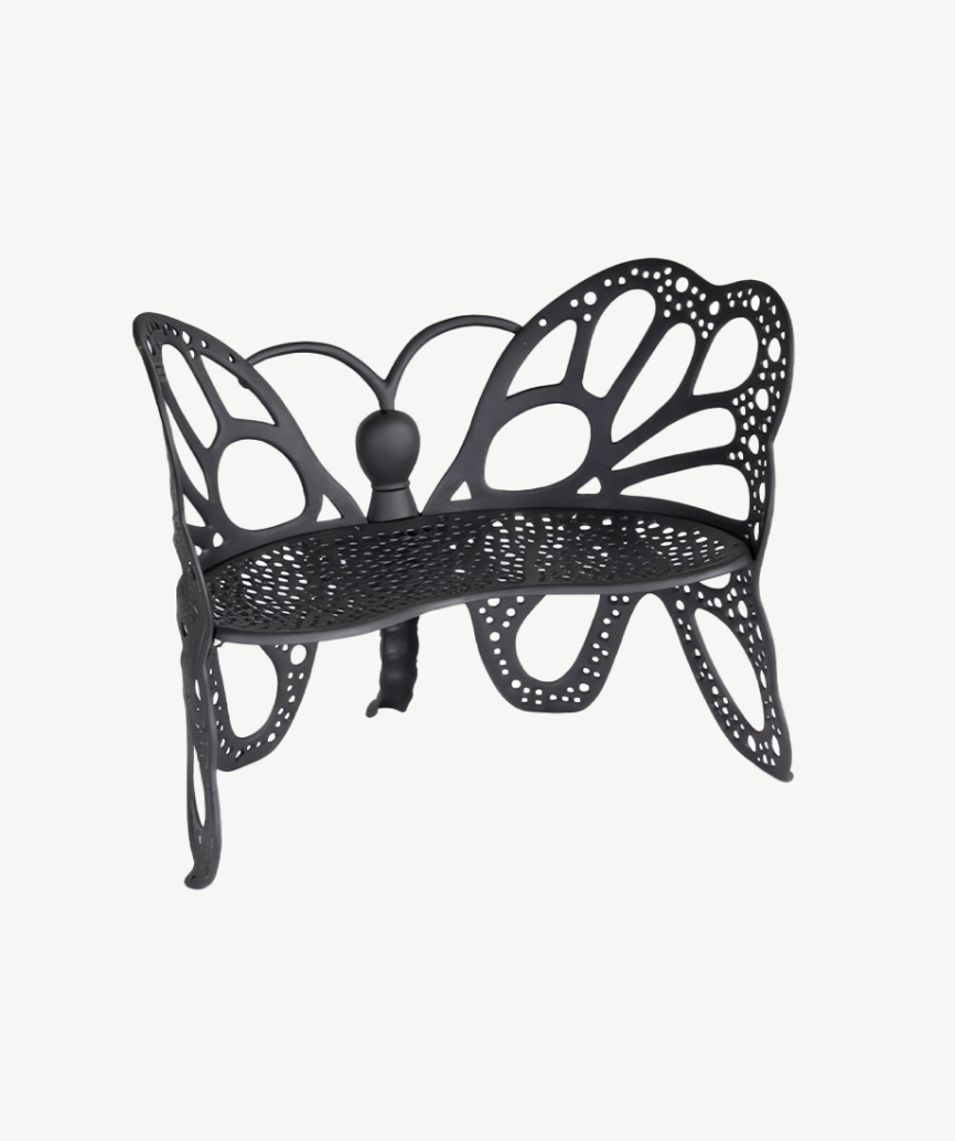 Elegant Butterfly Bench offering durable, all-weather seating and a refined design for indoor or outdoor use.