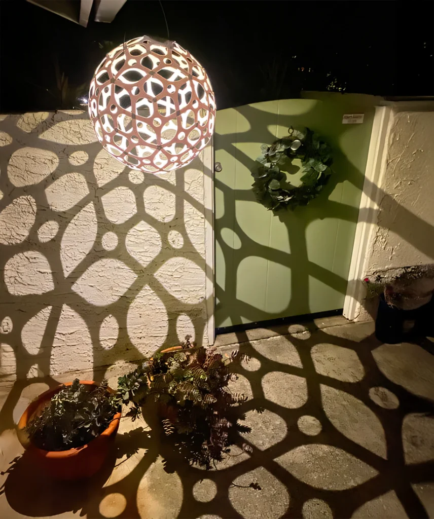 GlowTheory 18-inch Solar Lamp showcasing a unique spherical design for captivating outdoor illumination