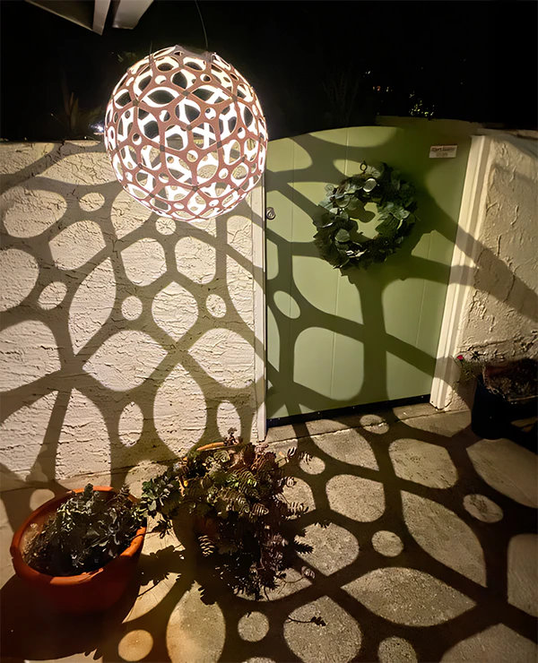 GlowTheory 18-inch Solar Lamp showcasing a unique spherical design for captivating outdoor illumination